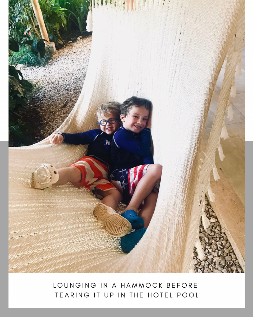 Kids in hammock by pool