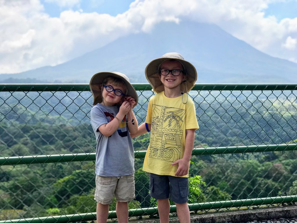 kids in front of Arenal Volcano