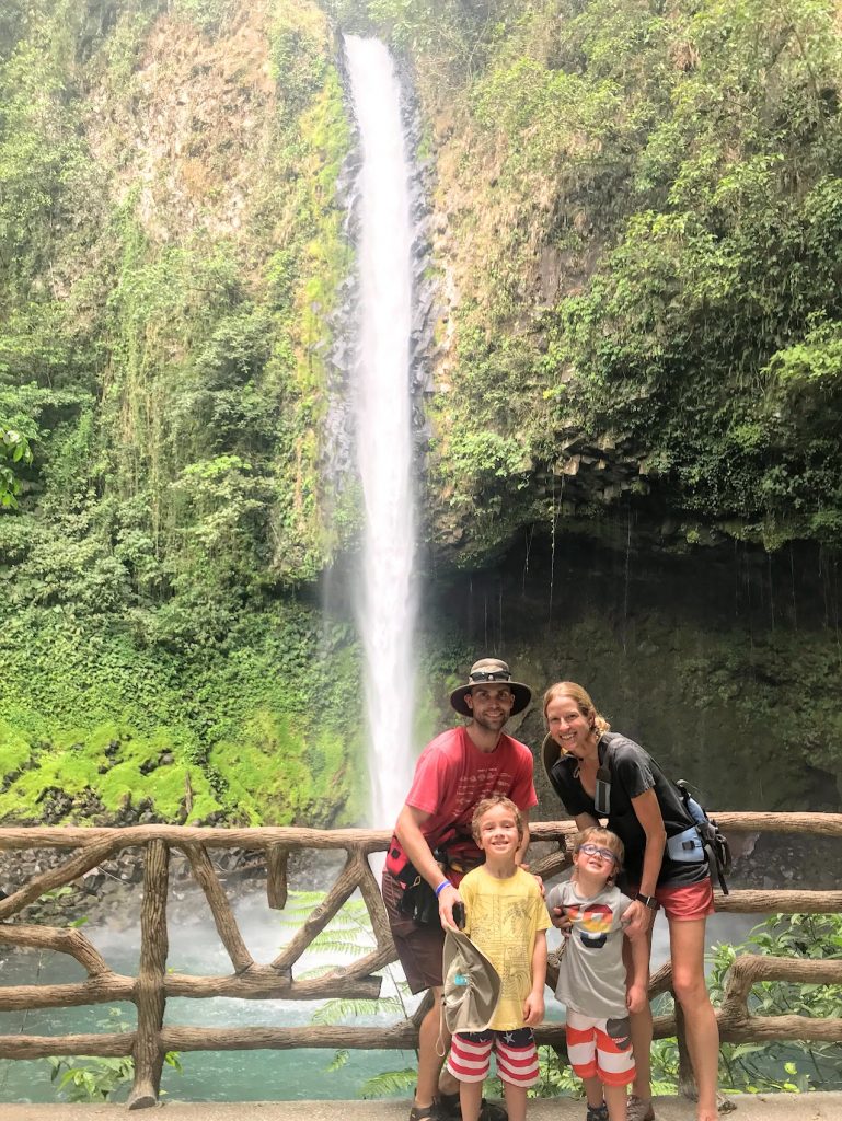 Family in front of Fortuna Waterfall